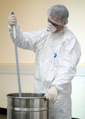 A single point sampler being used to take a sample from a known point within a container