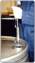 This sampler is designed to take a sample from the bottom of a container